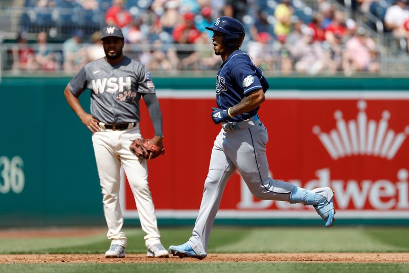 Apr 5, 2023; Washington, District of Columbia, USA; Tampa Bay Rays shortstop Wander Franco (5) rounds the bases after hitting a two run home run during the third inning at Nationals Park. Mandatory Credit: Geoff Burke-USA TODAY Sports