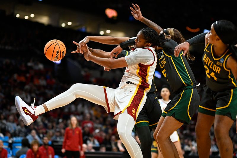 Mar 30, 2024; Portland, OR, USA; USC Trojans center Rayah Marshall (13) battles for a rebound during the second half against Baylor Lady Bears guard Darianna Littlepage-Buggs (5) in the semifinals of the Portland Regional of the 2024 NCAA Tournament at the Moda Center. Mandatory Credit: Troy Wayrynen-USA TODAY Sports