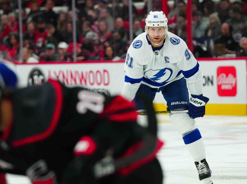 Nov 24, 2023; Raleigh, North Carolina, USA; Tampa Bay Lightning center Steven Stamkos (91) looks on against the Carolina Hurricanes during the second period at PNC Arena. Mandatory Credit: James Guillory-USA TODAY Sports