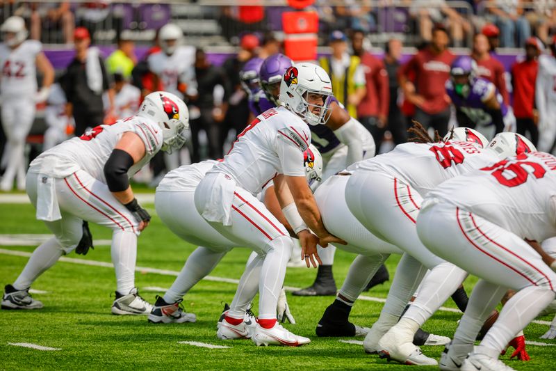 Arizona Cardinals quarterback David Blough (17) takes a snap against the Minnesota Vikings during the first half of an NFL preseason football game, Saturday, Aug. 26, 2023, in Minneapolis. (AP Photo/Bruce Kluckhohn)