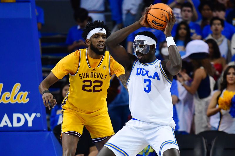 Mar 2, 2023; Los Angeles, California, USA; UCLA Bruins forward Adem Bona (3) controls the ball against Arizona State Sun Devils forward Warren Washington (22) during the first half at Pauley Pavilion. Mandatory Credit: Gary A. Vasquez-USA TODAY Sports