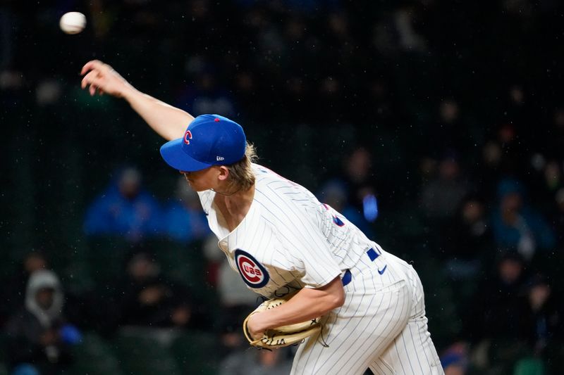 Apr 3, 2024; Chicago, Illinois, USA; Chicago Cubs relief pitcher Ben Brown (32) throws the ball against the Colorado Rockies during the fifth inning at Wrigley Field. Mandatory Credit: David Banks-USA TODAY Sports