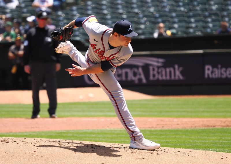 May 31, 2023; Oakland, California, USA; Atlanta Braves  starting pitcher Jared Shuster (45) pitches the ball against the against the Oakland Athletics during the first inning at Oakland-Alameda County Coliseum. Mandatory Credit: Kelley L Cox-USA TODAY Sports