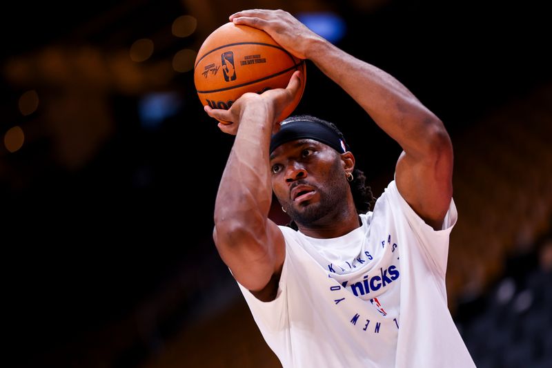 TORONTO, CANADA - DECEMBER 9: Precious Achiuwa #5 of the New York Knicks warms up before the game against the Toronto Raptors on December 9, 2024 at the Scotiabank Arena in Toronto, Ontario, Canada.  NOTE TO USER: User expressly acknowledges and agrees that, by downloading and or using this Photograph, user is consenting to the terms and conditions of the Getty Images License Agreement.  Mandatory Copyright Notice: Copyright 2024 NBAE (Photo by Vaughn Ridley/NBAE via Getty Images)