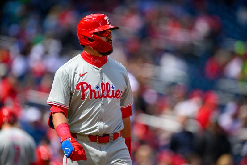 Apr 7, 2024; Washington, District of Columbia, USA; Philadelphia Phillies designated hitter Kyle Schwarber (12) looks on during the first inning against the Washington Nationals at Nationals Park. Mandatory Credit: Reggie Hildred-USA TODAY Sports