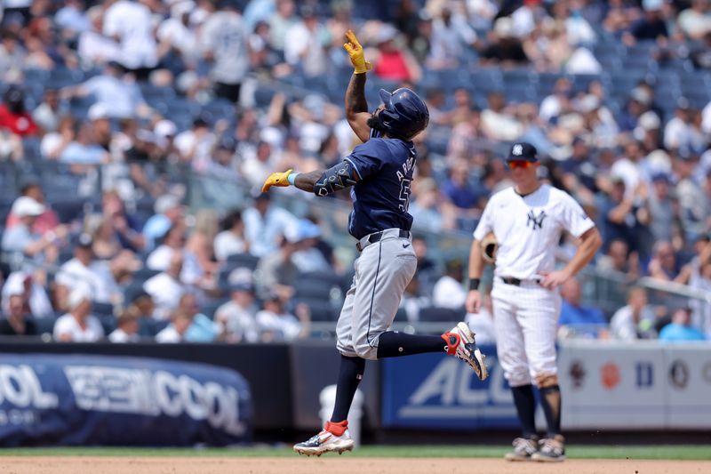 Jul 20, 2024; Bronx, New York, USA; Tampa Bay Rays left fielder Randy Arozarena (56) rounds the bases after hitting a two run home run against the New York Yankees during the seventh inning at Yankee Stadium. Mandatory Credit: Brad Penner-USA TODAY Sports