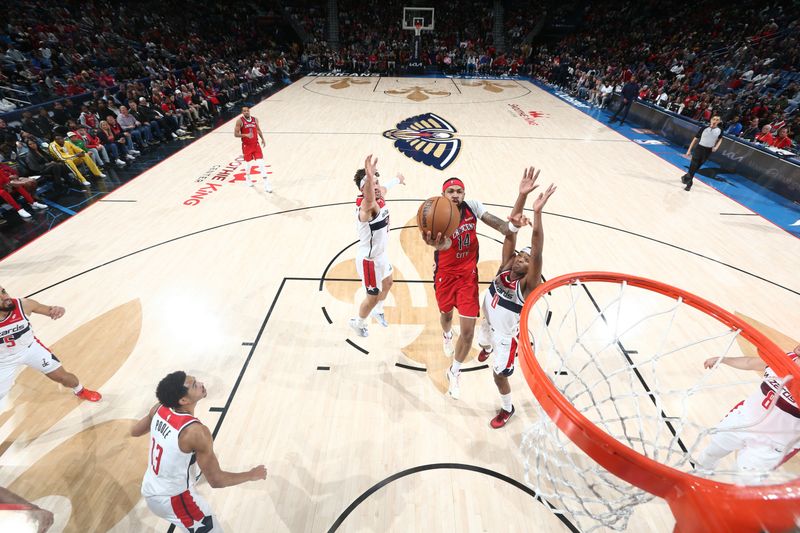 NEW ORLEANS, LA - FEBRUARY 14: Brandon Ingram #14 of the New Orleans Pelicans drives to the basket during the game against the Washington Wizards on February 14, 2024 at the Smoothie King Center in New Orleans, Louisiana. NOTE TO USER: User expressly acknowledges and agrees that, by downloading and or using this Photograph, user is consenting to the terms and conditions of the Getty Images License Agreement. Mandatory Copyright Notice: Copyright 2024 NBAE (Photo by Layne Murdoch Jr./NBAE via Getty Images)