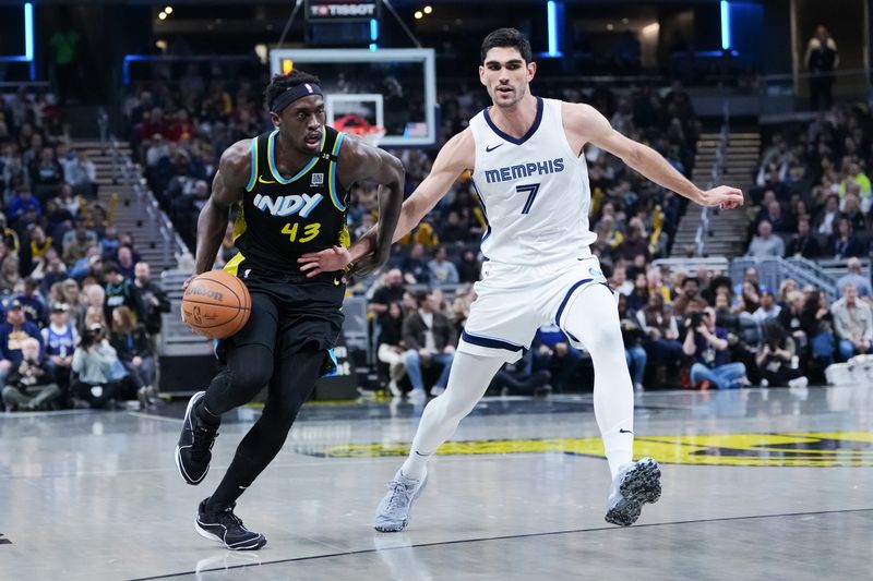 INDIANAPOLIS, INDIANA - JANUARY 28: Pascal Siakam #43 of the Indiana Pacers dribbles the ball while being guarded by Santi Aldama #7 of the Memphis Grizzlies in the first quarter at Gainbridge Fieldhouse on January 28, 2024 in Indianapolis, Indiana. NOTE TO USER: User expressly acknowledges and agrees that, by downloading and or using this photograph, User is consenting to the terms and conditions of the Getty Images License Agreement. (Photo by Dylan Buell/Getty Images)