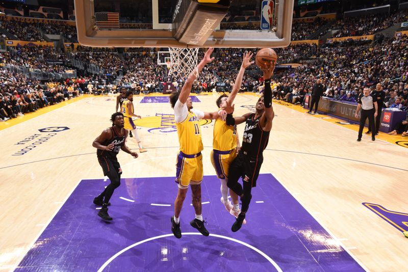 LOS ANGELES, CA - FEBRUARY 13: Jaden Ivey #23 of the Detroit Pistons drives to the basket during the game against the Los Angeles Lakers on February 13, 2024 at Crypto.Com Arena in Los Angeles, California. NOTE TO USER: User expressly acknowledges and agrees that, by downloading and/or using this Photograph, user is consenting to the terms and conditions of the Getty Images License Agreement. Mandatory Copyright Notice: Copyright 2024 NBAE (Photo by Adam Pantozzi/NBAE via Getty Images)