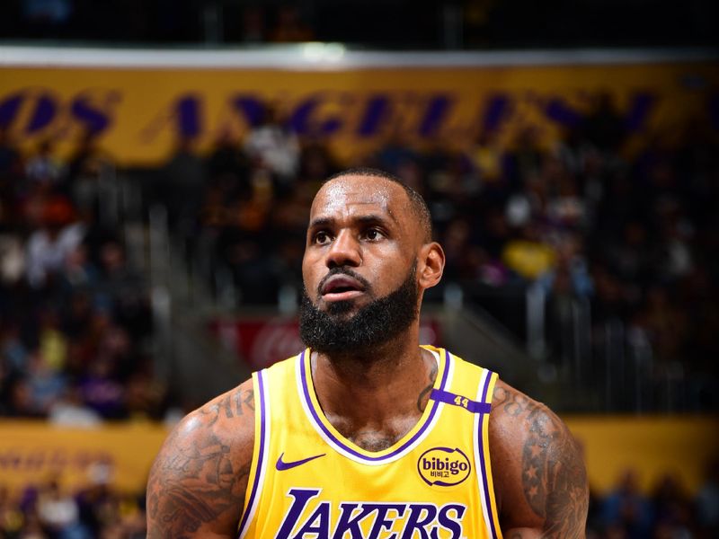 LOS ANGELES, CA - NOVEMBER 13: LeBron James #23 of the Los Angeles Lakers prepares to shoot a free throw during the game against the Memphis Grizzlies on November 13, 2024 at Crypto.Com Arena in Los Angeles, California. NOTE TO USER: User expressly acknowledges and agrees that, by downloading and/or using this Photograph, user is consenting to the terms and conditions of the Getty Images License Agreement. Mandatory Copyright Notice: Copyright 2024 NBAE (Photo by Adam Pantozzi/NBAE via Getty Images)