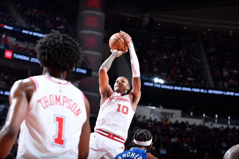 HOUSTON, TX - APRIL 9: Jabari Smith Jr. #10 of the Houston Rockets shoots the ball during the game against the Orlando Magic on April 9, 2024 at the Toyota Center in Houston, Texas. NOTE TO USER: User expressly acknowledges and agrees that, by downloading and or using this photograph, User is consenting to the terms and conditions of the Getty Images License Agreement. Mandatory Copyright Notice: Copyright 2024 NBAE (Photo by Logan Riely/NBAE via Getty Images)