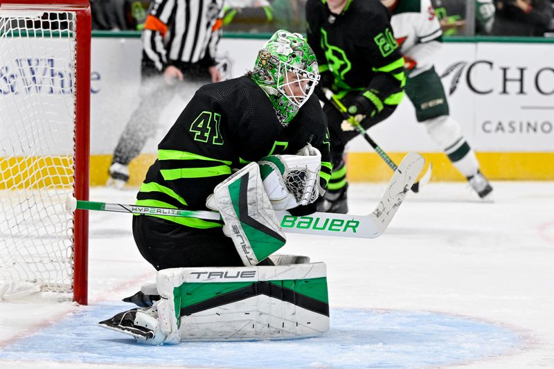 Jan 10, 2024; Dallas, Texas, USA; Dallas Stars goaltender Scott Wedgewood (41) makes a save on a Minnesota Wild shot during the third period at the American Airlines Center. Mandatory Credit: Jerome Miron-USA TODAY Sports