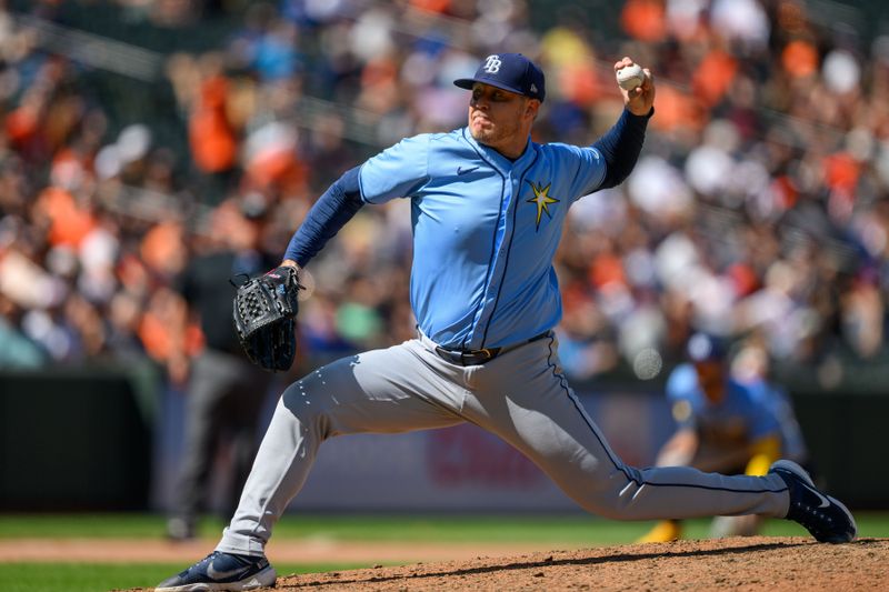 Sep 8, 2024; Baltimore, Maryland, USA; Tampa Bay Rays pitcher Garrett Cleavinger (60) throws a pitch during the eighth inning against the Baltimore Orioles at Oriole Park at Camden Yards. Mandatory Credit: Reggie Hildred-Imagn Images