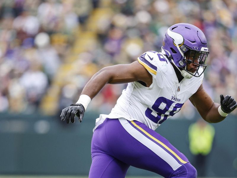 Minnesota Vikings linebacker D.J. Wonnum (98) on the field during an NFL football game against the Green Bay Packers Sunday, Oct. 29, 2023, in Green Bay, Wis. (AP Photo/Jeffrey Phelps)