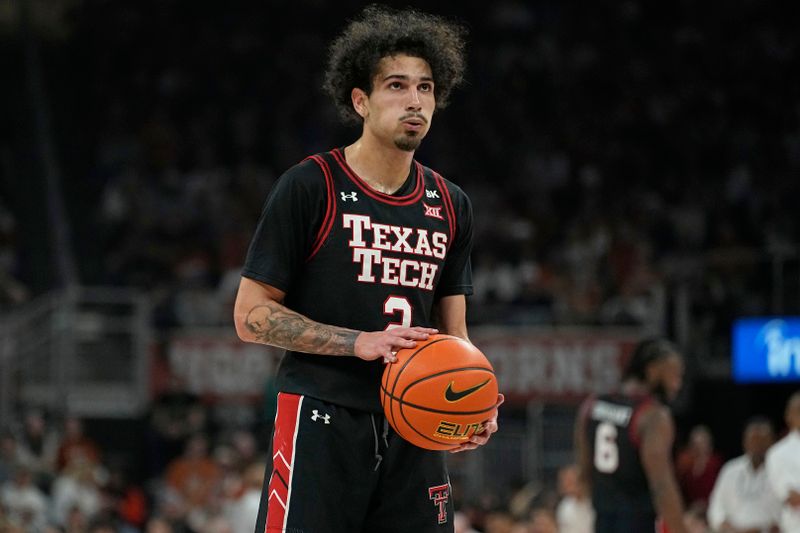 Jan 6, 2024; Austin, Texas, USA; Texas Tech Red Raiders guard Pop Isaacs (2) shoots a free throw during the second half against the Texas Longhorns at Moody Center. Mandatory Credit: Scott Wachter-USA TODAY Sports