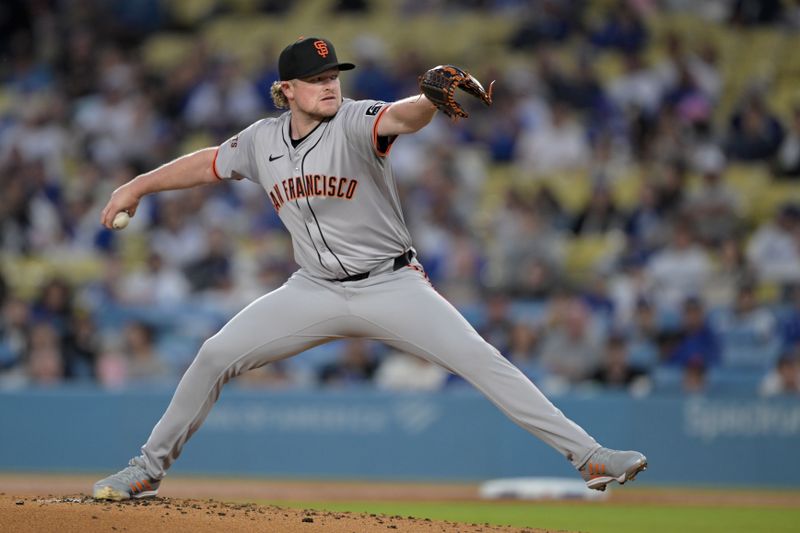 Apr 2, 2024; Los Angeles, California, USA;  San Francisco Giants starting pitcher Logan Webb (62) delivers in the first inning against the Los Angeles Dodgers at Dodger Stadium. Mandatory Credit: Jayne Kamin-Oncea-USA TODAY Sports