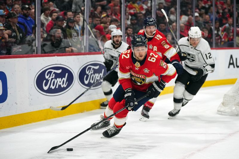 Jan 11, 2024; Sunrise, Florida, USA; Florida Panthers defenseman Brandon Montour (62) controls the puck against the Los Angeles Kings during the first period at Amerant Bank Arena. Mandatory Credit: Jasen Vinlove-USA TODAY Sports