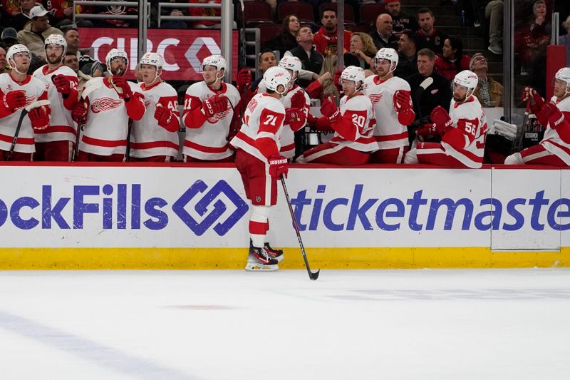 Nov 6, 2024; Chicago, Illinois, USA; Detroit Red Wings center Dylan Larkin (71) celebrates his goal against the Chicago Blackhawks during the second period at United Center. Mandatory Credit: David Banks-Imagn Images