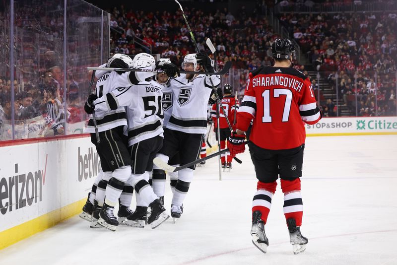 Feb 23, 2023; Newark, New Jersey, USA; Los Angeles Kings center Anze Kopitar (11) celebrates his goal against the New Jersey Devils during the first period at Prudential Center. Mandatory Credit: Ed Mulholland-USA TODAY Sports