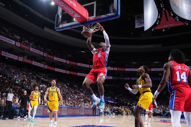 PHILADELPHIA, PA - DECEMBER 13: Andre Drummond #5 of the Philadelphia 76ers dunks the ball during the game against the Indiana Pacers on December 13, 2024 at the Wells Fargo Center in Philadelphia, Pennsylvania NOTE TO USER: User expressly acknowledges and agrees that, by downloading and/or using this Photograph, user is consenting to the terms and conditions of the Getty Images License Agreement. Mandatory Copyright Notice: Copyright 2024 NBAE (Photo by Jesse D. Garrabrant/NBAE via Getty Images)