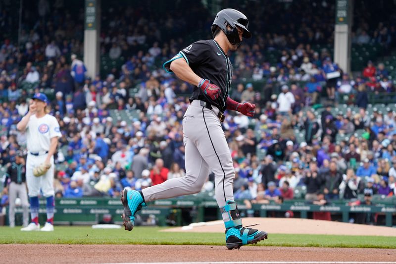 Apr 19, 2025; Chicago, Illinois, USA; Arizona Diamondbacks outfielder Corbin Carroll (7) runs the bases after hitting a home run against the Chicago Cubs during the first inning at Wrigley Field. Mandatory Credit: David Banks-Imagn Images