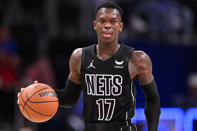 DETROIT, MICHIGAN - MARCH 07: Dennis Schroder #17 of the Brooklyn Nets dribbles the ball against the Detroit Pistons during the second half at Little Caesars Arena on March 07, 2024 in Detroit, Michigan. NOTE TO USER: User expressly acknowledges and agrees that, by downloading and or using this photograph, User is consenting to the terms and conditions of the Getty Images License Agreement. (Photo by Luke Hales/Getty Images)