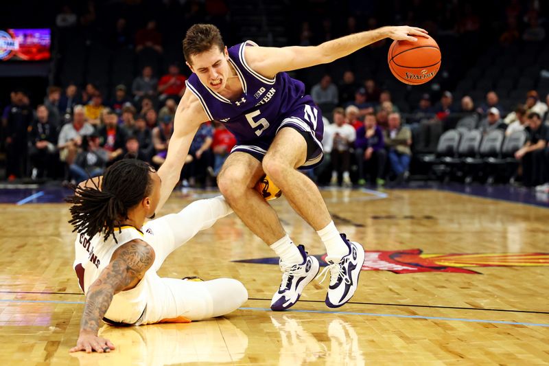 Dec 20, 2023; Phoenix, Arizona, USA; Northwestern Wildcats guard Ryan Langborg (5) drives to the basket against Arizona State Sun Devils guard Frankie Collins (1) during the first half during the Hall of Series at Footprint Center. Mandatory Credit: Mark J. Rebilas-USA TODAY Sports