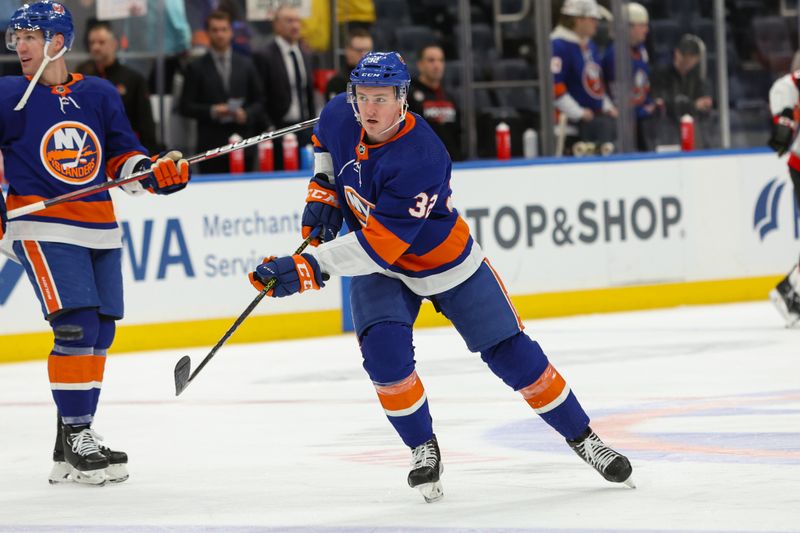 Mar 16, 2024; Elmont, New York, USA;  New York Islanders center Kyle MacLean (32) warms up before a game against the against the Ottawa Senators at UBS Arena. Mandatory Credit: Thomas Salus-USA TODAY Sports