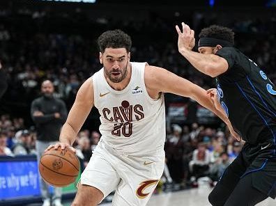 DALLAS, TX - DECEMBER 27: Georges Niang #20 of the Cleveland Cavaliers drives to the basket during the game against the Dallas Mavericks on December 27, 2023 at the American Airlines Center in Dallas, Texas. NOTE TO USER: User expressly acknowledges and agrees that, by downloading and or using this photograph, User is consenting to the terms and conditions of the Getty Images License Agreement. Mandatory Copyright Notice: Copyright 2023 NBAE (Photo by Glenn James/NBAE via Getty Images)