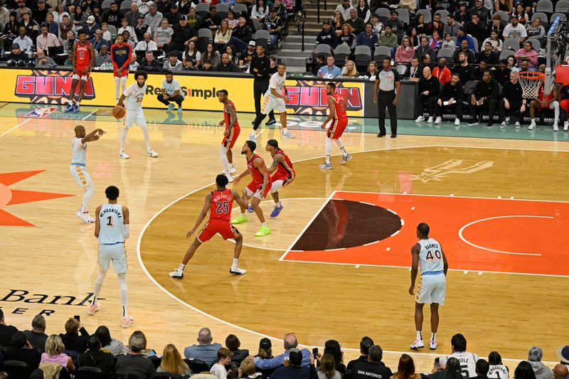 SAN ANTONIO, TX - DECEMBER 8: Chris Paul #3 of the San Antonio Spurs passes the ball to Harrison Barnes to tie Jason Kidd for number two all-time in assists during the game against the New Orleans Pelicans on December 8, 2024 at the Frost Bank Center in San Antonio, Texas. NOTE TO USER: User expressly acknowledges and agrees that, by downloading and or using this photograph, user is consenting to the terms and conditions of the Getty Images License Agreement. Mandatory Copyright Notice: Copyright 2024 NBAE (Photos by David Dow/NBAE via Getty Images)