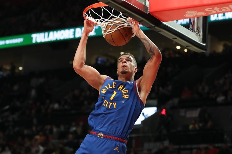 PORTLAND, OREGON - FEBRUARY 23: Michael Porter Jr. #1 of the Denver Nuggets dunks against the Portland Trail Blazers during the third quarter at Moda Center on February 23, 2024 in Portland, Oregon. NOTE TO USER: User expressly acknowledges and agrees that, by downloading and or using this photograph, User is consenting to the terms and conditions of the Getty Images License Agreement.? (Photo by Amanda Loman/Getty Images)