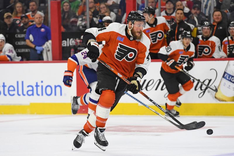 Sep 26, 2024; Philadelphia, Pennsylvania, USA; Philadelphia Flyers left wing Nicolas Deslauriers (44) skates with the puck against the New York Islanders during the second period at Wells Fargo Center. Mandatory Credit: Eric Hartline-Imagn Images