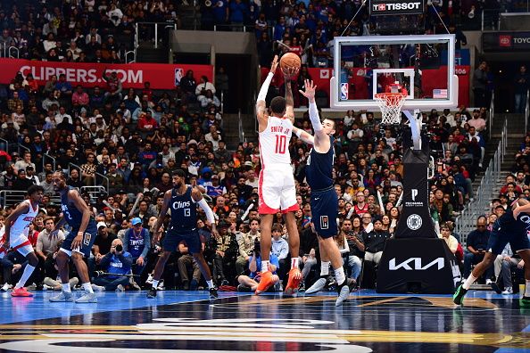 LOS ANGELES, CA - NOVEMBER 17: Jabari Smith Jr. #10 of the Houston Rockets shoots a three point basket against the LA Clippers during the In-Season Tournament on November 17, 2023 at Crypto.Com Arena in Los Angeles, California. NOTE TO USER: User expressly acknowledges and agrees that, by downloading and/or using this Photograph, user is consenting to the terms and conditions of the Getty Images License Agreement. Mandatory Copyright Notice: Copyright 2023 NBAE (Photo by Adam Pantozzi/NBAE via Getty Images)