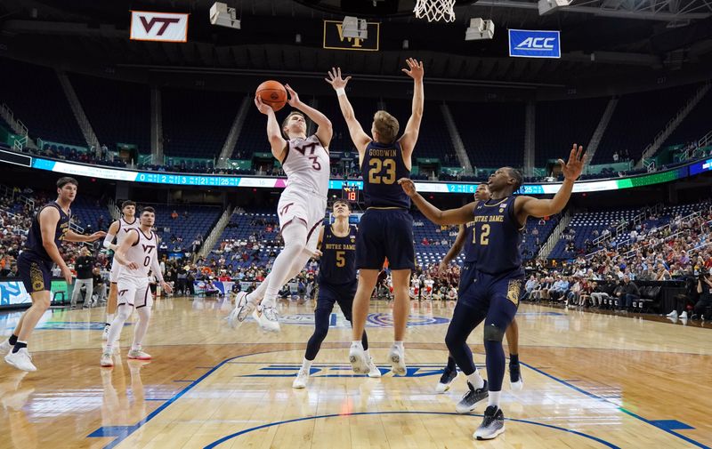 Mar 7, 2023; Greensboro, NC, USA; Virginia Tech Hokies guard Sean Pedulla (3) drives to the basket against the Notre Dame Fighting Irish during the first half of the first round of the ACC tournament at Greensboro Coliseum. Mandatory Credit: John David Mercer-USA TODAY Sports