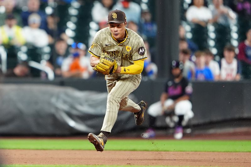 Jun 14, 2024; New York City, New York, USA;  San Diego Padres shortstop Ha-Seong Kim (7) fields a ground ball hit by New York Mets shortstop Francisco Lindor (not pictured) during the eighth inning at Citi Field. Mandatory Credit: Gregory Fisher-USA TODAY Sports