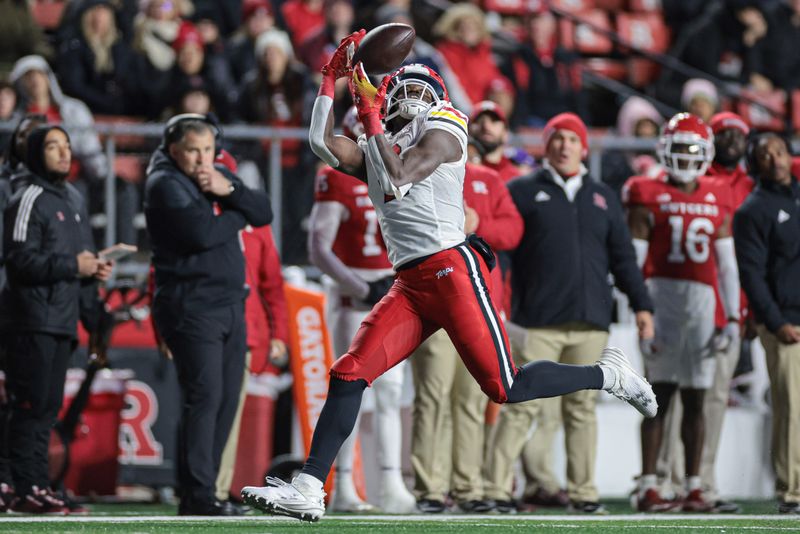 Nov 25, 2023; Piscataway, New Jersey, USA; Maryland Terrapins tight end Corey Dyches (2) catches the ball for a touchdown reception during the first half against the Rutgers Scarlet Knights at SHI Stadium. Mandatory Credit: Vincent Carchietta-USA TODAY Sports