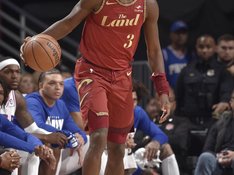 CLEVELAND, OH - FEBRUARY 12: Caris LeVert #3 of the Cleveland Cavaliers handles the ball during the game against the Philadelphia 76ers on February 12, 2024 at Rocket Mortgage FieldHouse in Cleveland, Ohio. NOTE TO USER: User expressly acknowledges and agrees that, by downloading and/or using this Photograph, user is consenting to the terms and conditions of the Getty Images License Agreement. Mandatory Copyright Notice: Copyright 2024 NBAE (Photo by David Liam Kyle/NBAE via Getty Images)