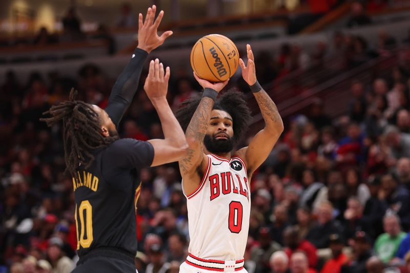 CHICAGO, ILLINOIS - FEBRUARY 28: Coby White #0 of the Chicago Bulls shoots a three pointer against the Cleveland Cavaliers during the second half at the United Center on February 28, 2024 in Chicago, Illinois. NOTE TO USER: User expressly acknowledges and agrees that, by downloading and or using this photograph, User is consenting to the terms and conditions of the Getty Images License Agreement. (Photo by Michael Reaves/Getty Images)