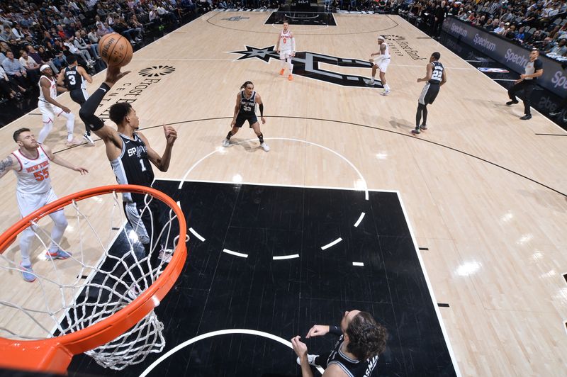 SAN ANTONIO, TX - MARCH 29: Victor Wembanyama #1 of the San Antonio Spurs goes up for the rebound during the game against the New York Knicks on March 29, 2024 at the Frost Bank Center in San Antonio, Texas. NOTE TO USER: User expressly acknowledges and agrees that, by downloading and or using this photograph, user is consenting to the terms and conditions of the Getty Images License Agreement. Mandatory Copyright Notice: Copyright 2024 NBAE (Photos by Michael Gonzales/NBAE via Getty Images)