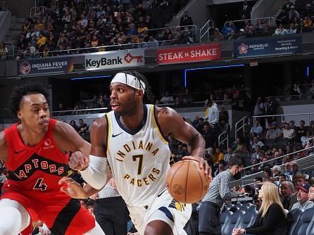 INDIANAPOLIS, IN - NOVEMBER 22: Buddy Heild #7 of the Indiana Pacers dribbles the ball during the game against the Toronto Raptors on November 22, 2023 at Gainbridge Fieldhouse in Indianapolis, Indiana. NOTE TO USER: User expressly acknowledges and agrees that, by downloading and or using this Photograph, user is consenting to the terms and conditions of the Getty Images License Agreement. Mandatory Copyright Notice: Copyright 2023 NBAE (Photo by Ron Hoskins/NBAE via Getty Images)