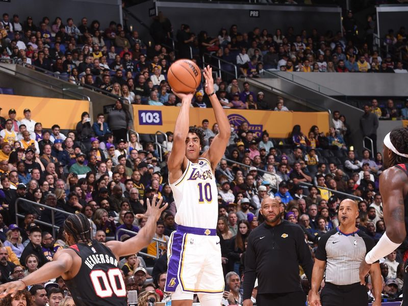 LOS ANGELES, CA - JANUARY 21:  Max Christie #10 of the Los Angeles Lakers shoots a three point basket during the game  on January 21, 2024 at Crypto.Com Arena in Los Angeles, California. NOTE TO USER: User expressly acknowledges and agrees that, by downloading and/or using this Photograph, user is consenting to the terms and conditions of the Getty Images License Agreement. Mandatory Copyright Notice: Copyright 2024 NBAE (Photo by Juan Ocampo/NBAE via Getty Images)