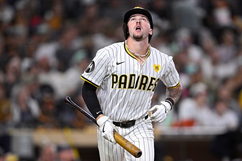 Jun 25, 2024; San Diego, California, USA; San Diego Padres center fielder Jackson Merrill (3) reacts after flying out during the fifth inning against the Washington Nationals at Petco Park. Mandatory Credit: Orlando Ramirez-USA TODAY Sports