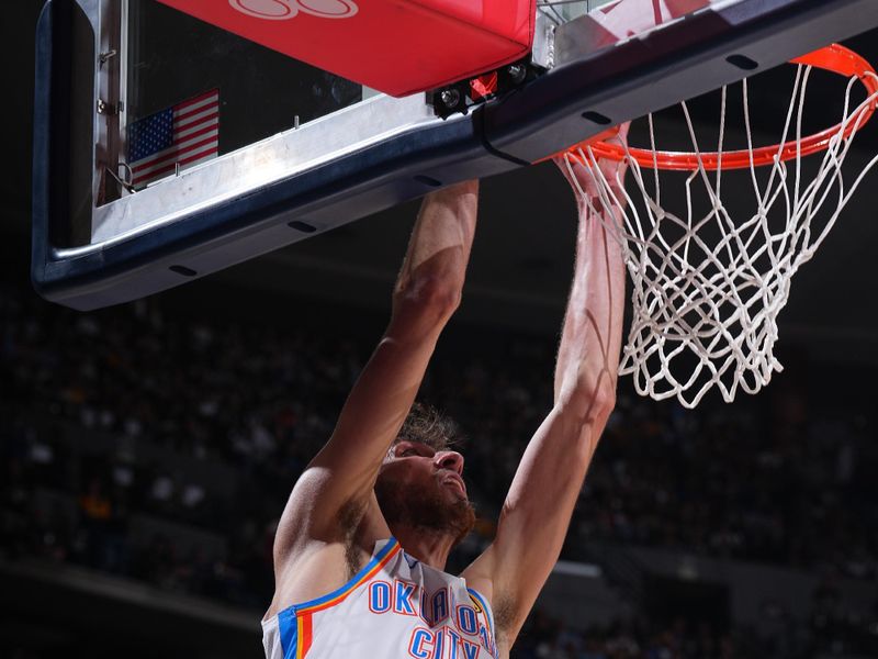DENVER, CO - MAY 9:  Chet Holmgren #7 of the Oklahoma City Thunder dunks the ball during the game against the Denver Nuggets during Round Two Game Three of the 2025 NBA Playoffs on May 9, 2025 at Ball Arena in Denver, Colorado. NOTE TO USER: User expressly acknowledges and agrees that, by downloading and/or using this Photograph, user is consenting to the terms and conditions of the Getty Images License Agreement. Mandatory Copyright Notice: Copyright 2025 NBAE (Photo by Garrett Ellwood/NBAE via Getty Images)