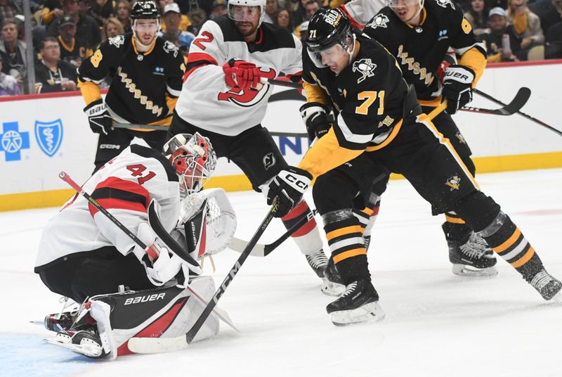 Nov 16, 2023; Pittsburgh, Pennsylvania, USA; Pittsburgh Penguins center Evgeni Malkin (71) is stopped by New Jersey Devils goalie Vitek Vanecek (41) during the third period at PPG Paints Arena. Mandatory Credit: Philip G. Pavely-USA TODAY Sports