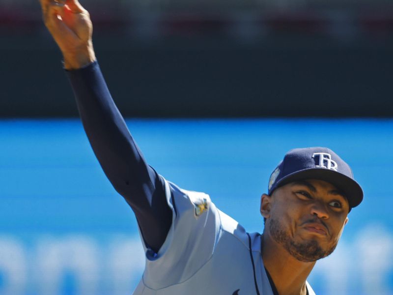 Sep 13, 2023; Minneapolis, Minnesota, USA; Tampa Bay Rays starting pitcher Taj Bradley (45) throws to the Minnesota Twins in the first inning at Target Field. Mandatory Credit: Bruce Kluckhohn-USA TODAY Sports