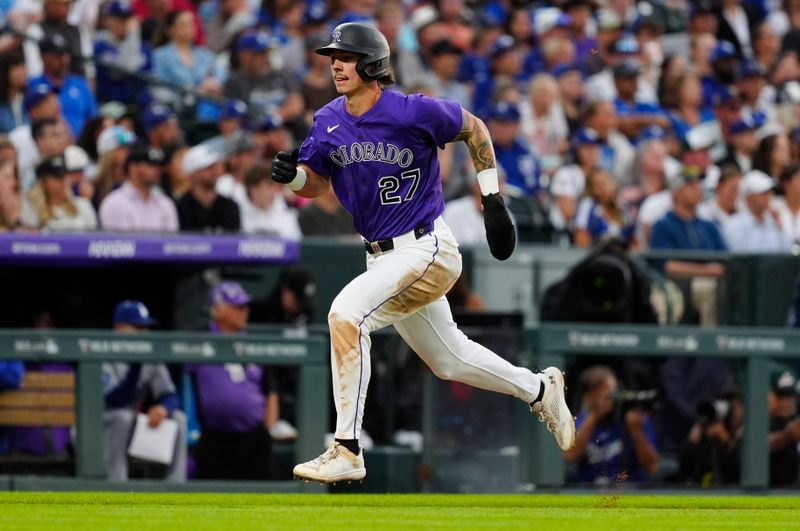 Jun 24, 2025; Denver, Colorado, USA; Colorado Rockies outfielder Jordan Beck (27) heads home to score a run in the fifth inning against the Los Angeles Dodgers at Coors Field. Mandatory Credit: Ron Chenoy-Imagn Images