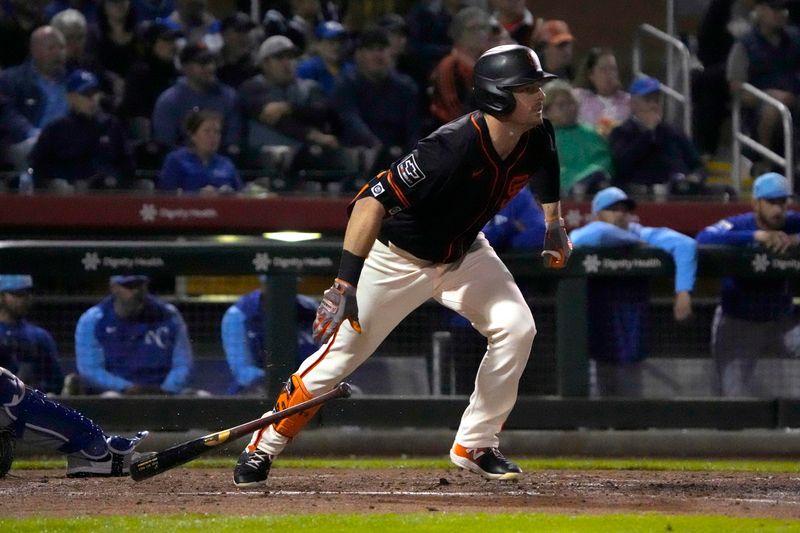 Mar 19, 2024; Scottsdale, Arizona, USA; San Francisco Giants center fielder Mike Yastrzemski (5) hits against the Kansas City Royals in the second inning at Scottsdale Stadium. Mandatory Credit: Rick Scuteri-USA TODAY Sports