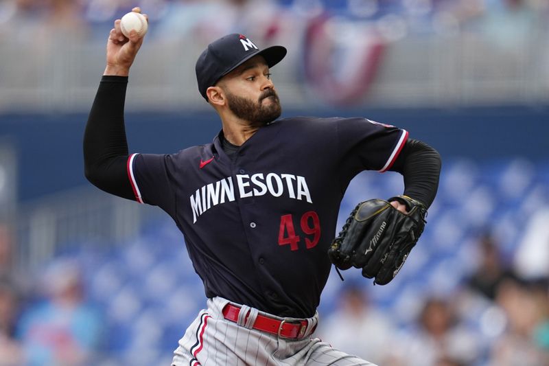 Apr 5, 2023; Miami, Florida, USA;  Minnesota Twins starting pitcher Pablo Lopez (49) pitches against the Miami Marlins in the first inning at loanDepot Park. Mandatory Credit: Jim Rassol-USA TODAY Sports