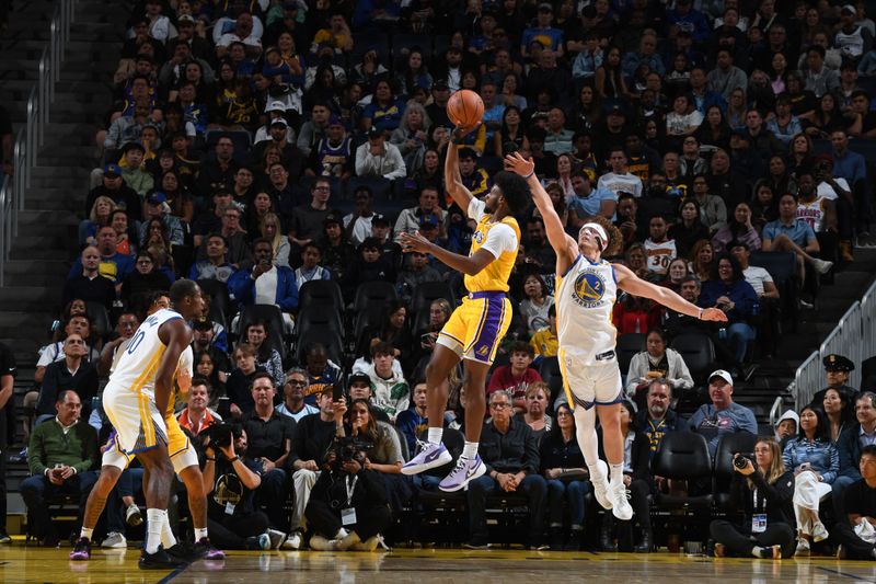 SAN FRANCISCO, CA - OCTOBER 18: Bronny James #9 of the Los Angeles Lakers shoots the ball during the game against the Golden State Warriors during a NBA Preseason game on October 18, 2024 at Chase Center in San Francisco, California. NOTE TO USER: User expressly acknowledges and agrees that, by downloading and or using this photograph, user is consenting to the terms and conditions of Getty Images License Agreement. Mandatory Copyright Notice: Copyright 2024 NBAE (Photo by Noah Graham/NBAE via Getty Images)