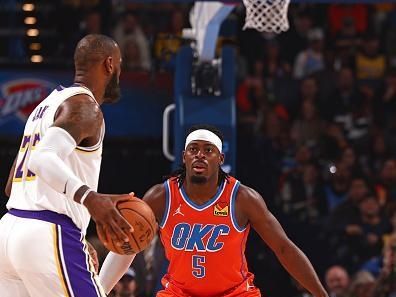 OKLAHOMA CITY, OK - DECEMBER 23: Luguentz Dort #5 of the Oklahoma City Thunder plays defense during the game against the Los Angeles Lakers on December 23, 2023 at Paycom Arena in Oklahoma City, Oklahoma. NOTE TO USER: User expressly acknowledges and agrees that, by downloading and or using this photograph, User is consenting to the terms and conditions of the Getty Images License Agreement. Mandatory Copyright Notice: Copyright 2023 NBAE (Photo by Zach Beeker/NBAE via Getty Images)